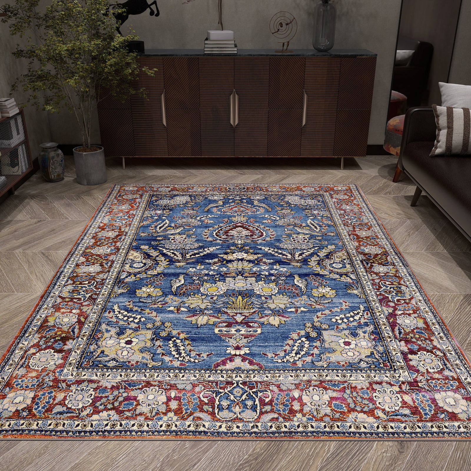Blue and red traditional Persian-style rug with floral motifs, styled in a modern living room.