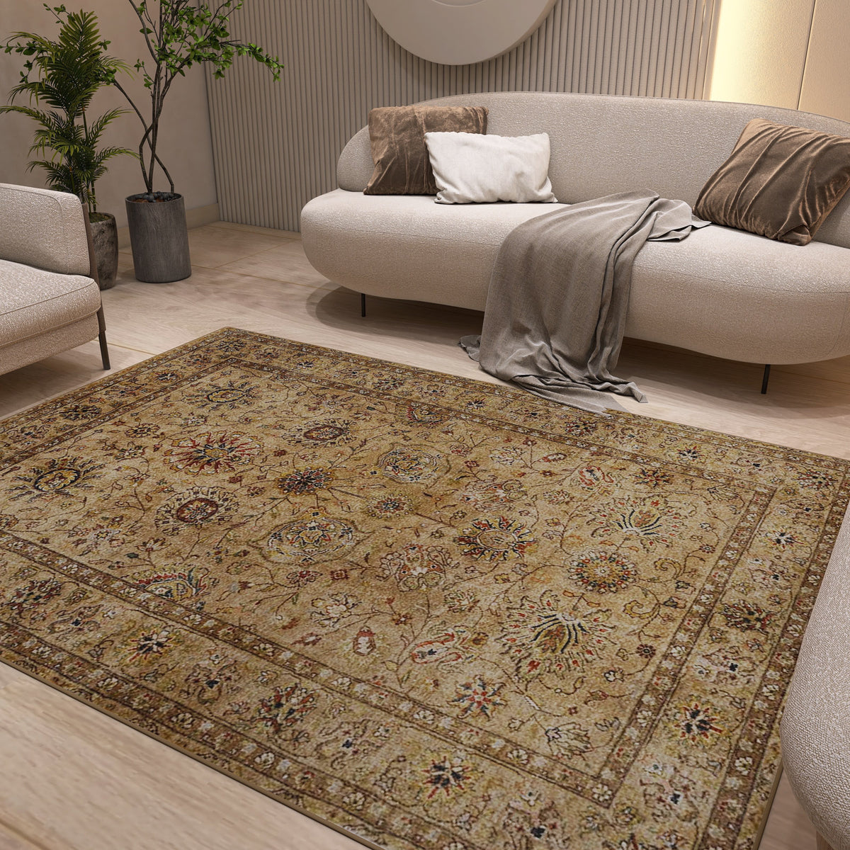 The Heritage Threads - Washable Rug - JRN1007 (Custom Size), featuring an intricate Oriental design in beige, is displayed on a light wooden floor in a modern living room with cream sofas, neutral cushions, a throw, and green potted plants.
