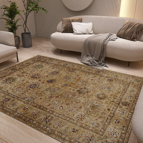 Load image 1 in gallery view. The Heritage Threads - Washable Rug - JRN1007 (Custom Size), featuring an intricate Oriental design in beige, is displayed on a light wooden floor in a modern living room with cream sofas, neutral cushions, a throw, and green potted plants.