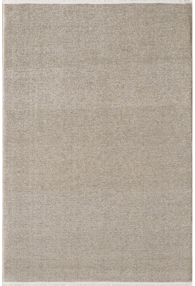 The Velvet Touch Beige Area Rug - PST002 is a large, rectangular contemporary rug in light beige with a subtle textured pattern and a borderless design. Displayed flat on a plain white background, it features a soft-touch finish.