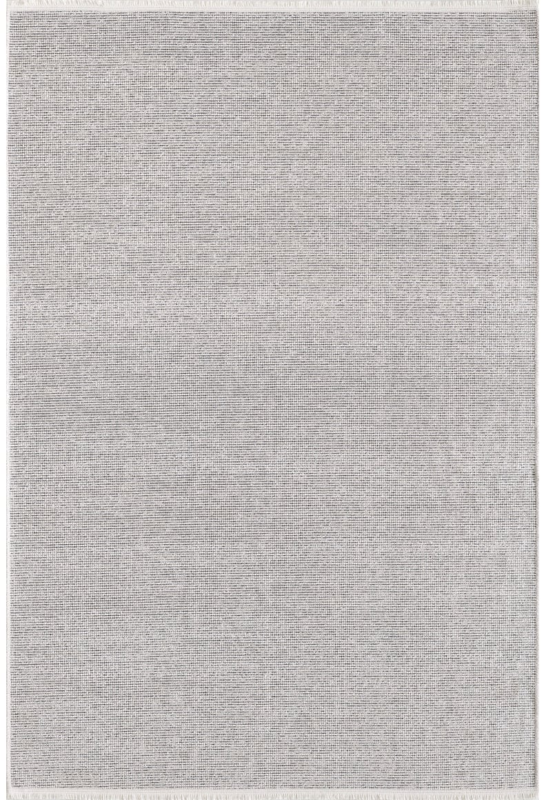The Velvet Touch Cream Area Rug (PST001) is a rectangular, light gray contemporary rug featuring a subtle textured pattern and slightly darker edges, displayed flat against a white background.