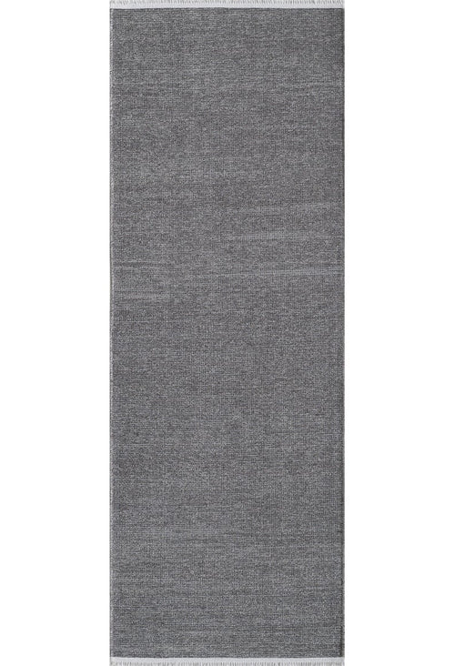 Load image 1 in gallery view. The Velvet Touch Dark Gray Area Rug - PST004 features a rectangular shape, subtle woven texture, and fringed edges in dark gray, highlighting minimalist style on a white background.