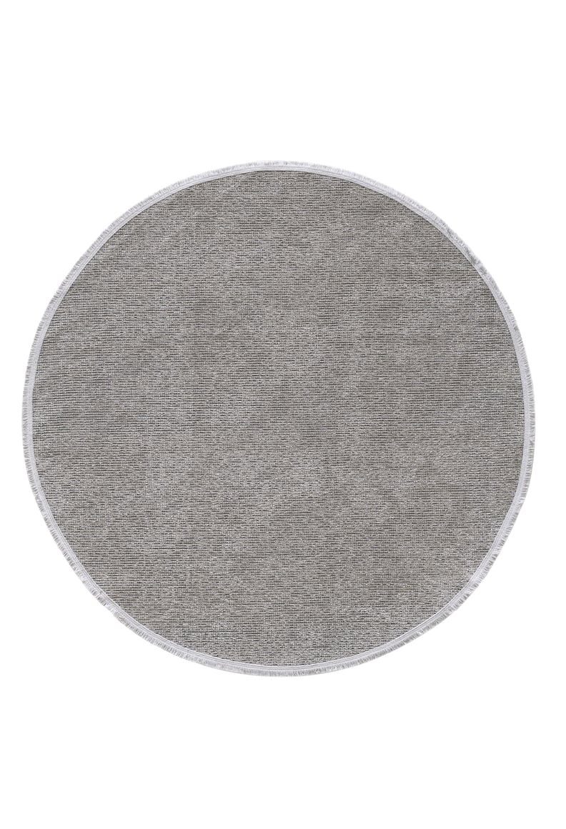 The Velvet Touch Gray Area Rug - PST003 features a round shape, subtle textured pattern, and thin white border—an elegant, minimalist choice for adding modern style to any space.