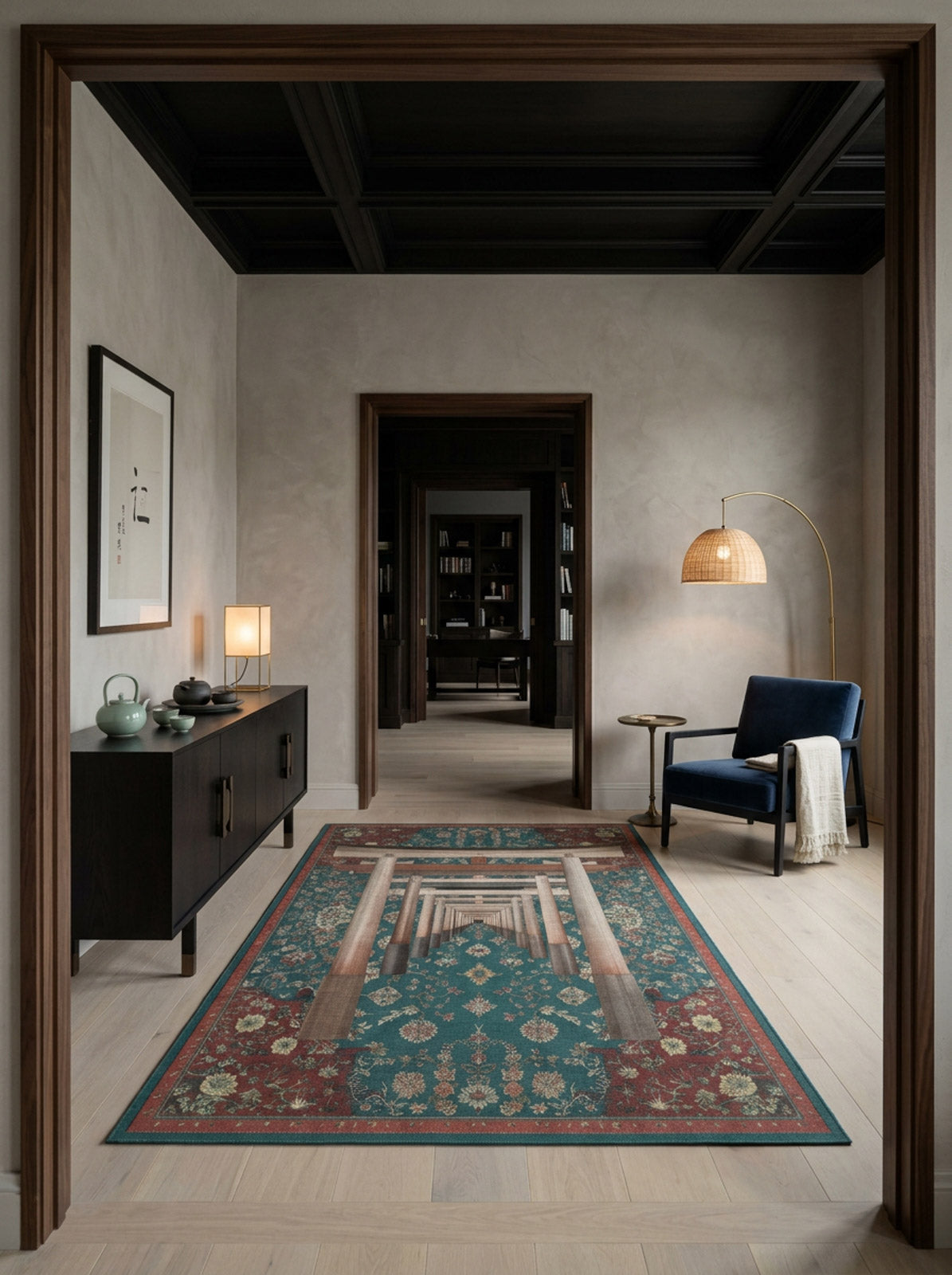 Teal and red traditional rug with a central architectural perspective pattern, styled in a dark-toned entryway.