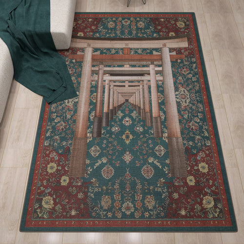 Bild 1 in Galerieansicht laden. The Verdant Frame - Washable Rug (JRS022) features torii gates and geometric floral motifs in red, green, and gold. Its rectangular shape looks stunning on wooden floors beside a green blanket and sofa—ideal for contemporary interiors.
