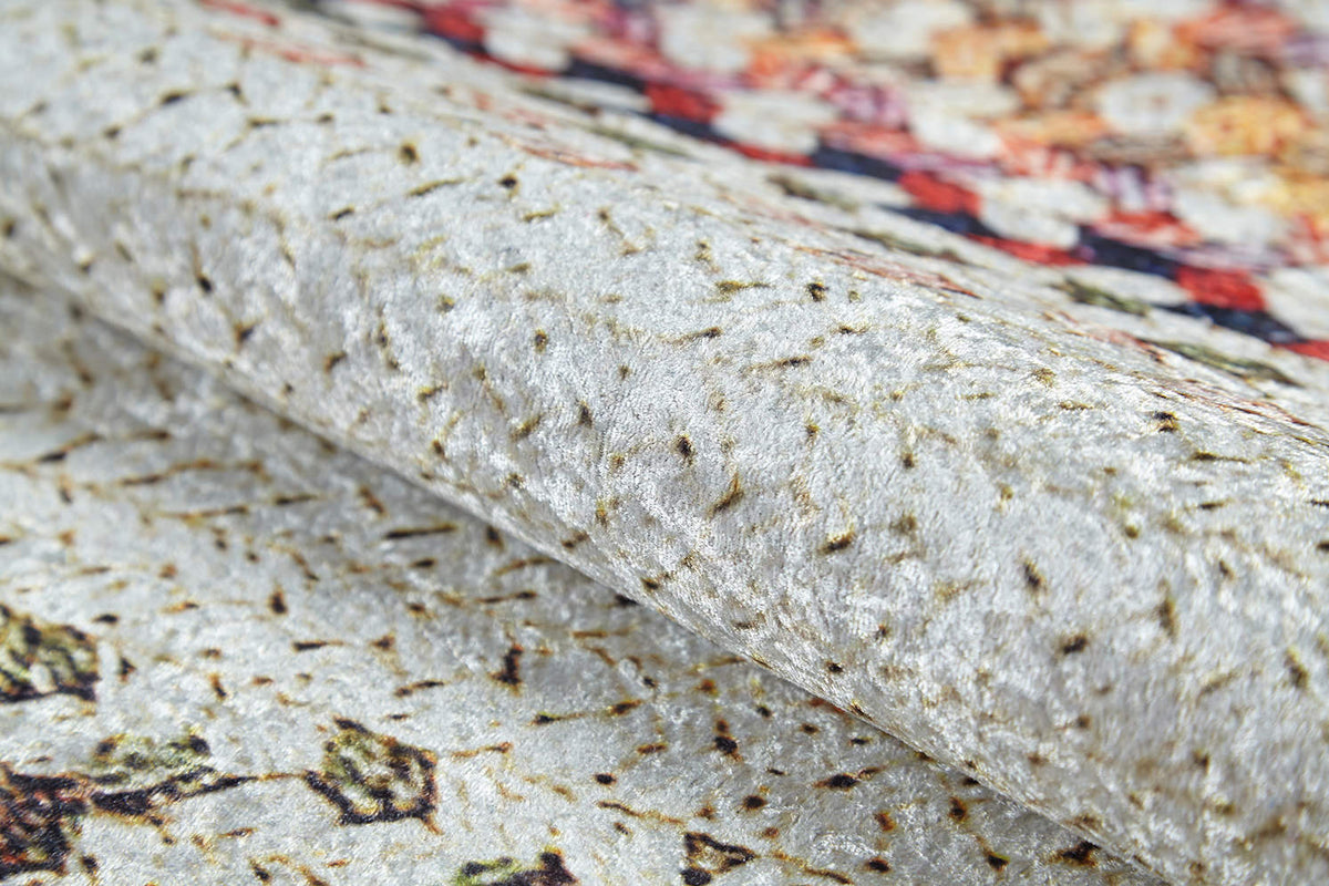 Close-up of the Vibrant Rainbow - Machine-Washable Rug (JR5001, Custom Size), featuring textured, light fabric with a subtle irregular green and brown pattern and gentle fold—an ideal choice for high-traffic areas.