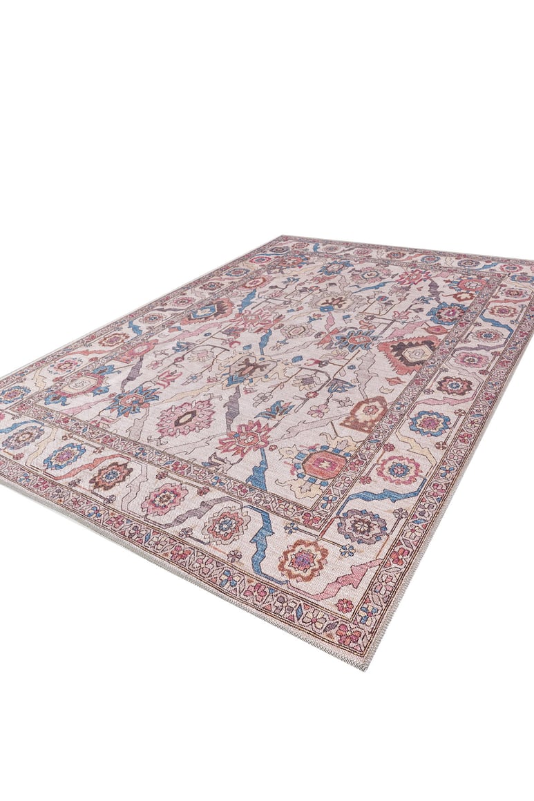 The Vivencia Authentic Washable Rug - LCC3016 (Outlet) US is a large rectangular rug with a detailed floral and geometric pattern in cream, red, blue, and gold, featuring a wide decorative border on a white background.