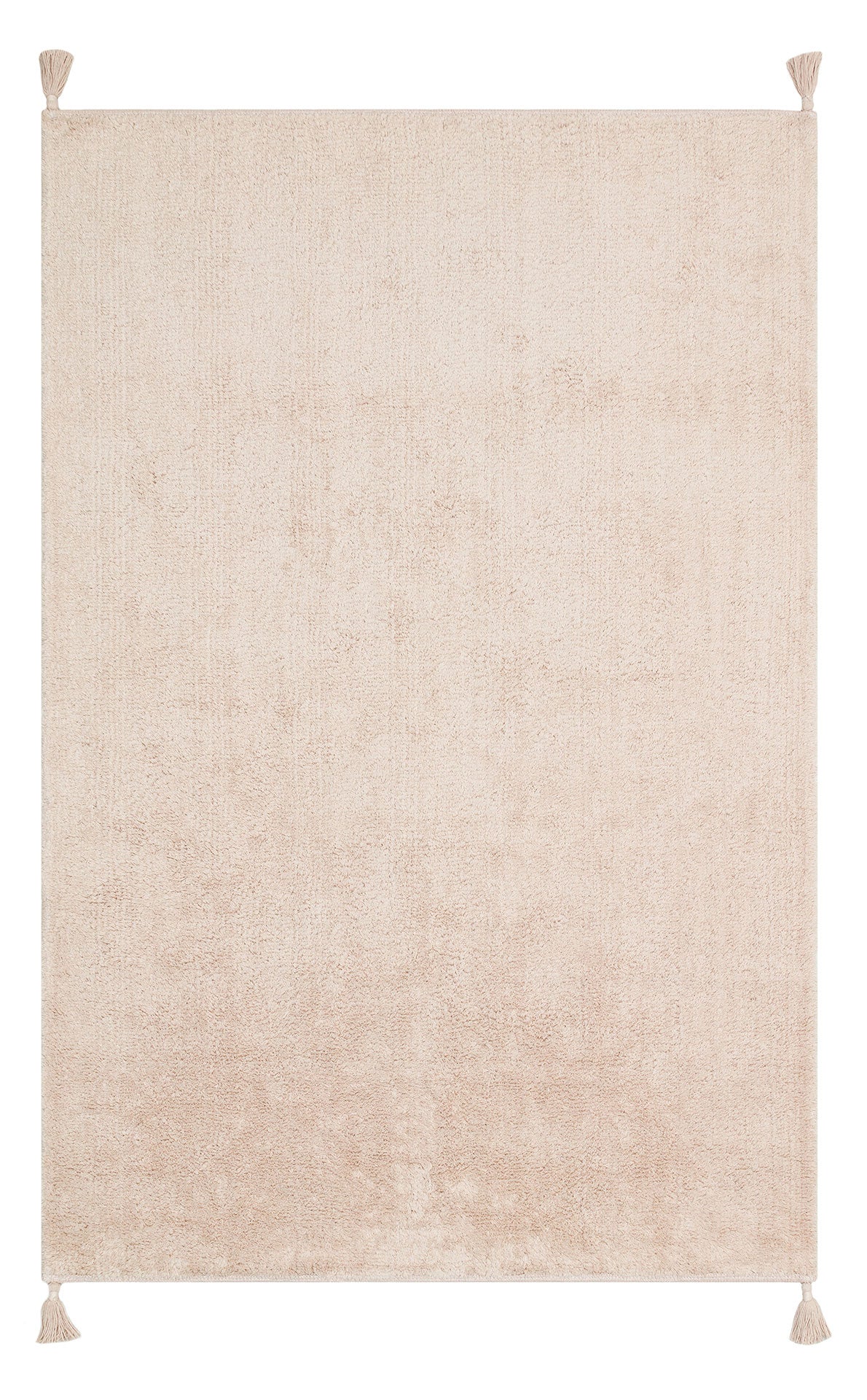 The Warm Sand - Washable Shaggy - CBNPLAIN is a rectangular, cream beige cotton rug with a soft, textured surface and small tassels at each corner for a simple, cozy touch.