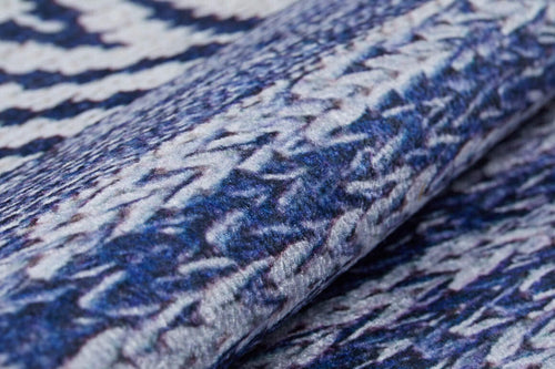 Load image 1 in gallery view. Close-up of the Wavy Wonders - Washable Rug - JR941 (Custom Size) showcasing its textured surface with a wavy zigzag pattern in blue, white, and gray. The soft, foldable rug is washable and perfect for high-traffic areas.