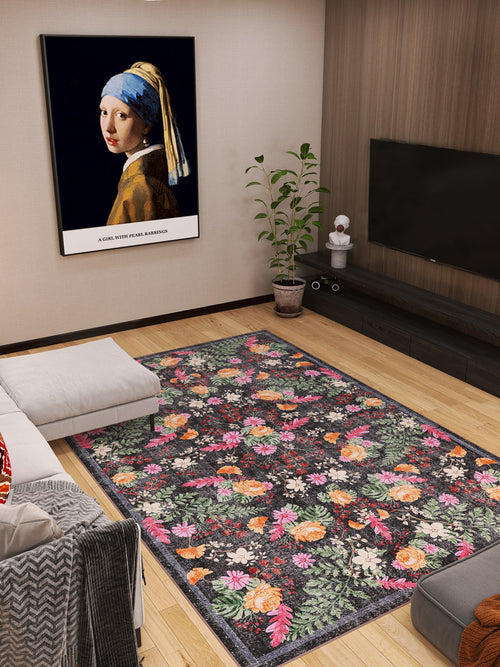 Load image 1 in gallery view. Modern living room featuring the Woven Grace - Washable Rug - JRN28, a sectional sofa, potted plant, wall-mounted TV, and a framed “Girl with a Pearl Earring” print displayed above the plant.