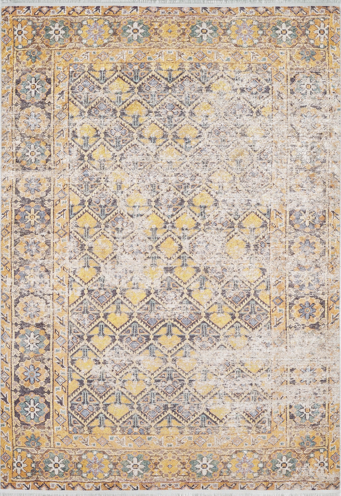 The Aged Splendor - Washable Rug - JR1906 is a vintage-style yellow-gold rug with a faded geometric and floral pattern in beige, blue, and gray. Its distressed look, detailed border, and washable design make it perfect for high-traffic areas.