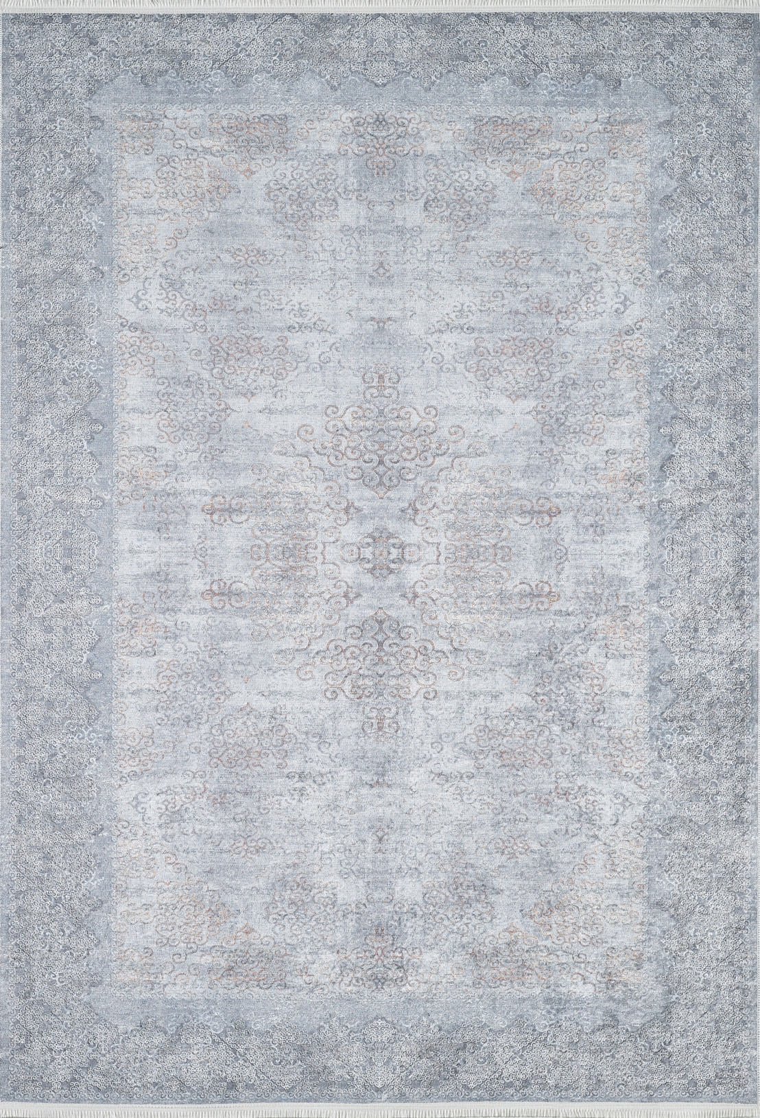 The Ancient Treasure - Washable Rug - JR1785 is a large rectangular rug with an intricate, faded medallion design in gray, blue, and beige tones—ideal for high-traffic areas and easy to clean.