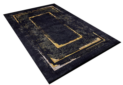 Load image 1 in gallery view. The Azure Glow - Washable Rug - JR1337 features a modern black design with a dark, textured background and layered gold and beige geometric borders—perfect for high-traffic areas. Shown angled on a white backdrop.