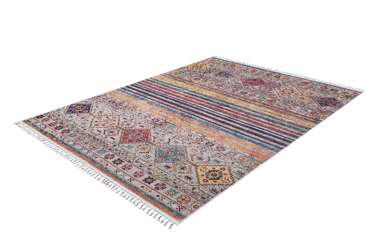 The Bohemian Bouquet - Washable Rug - JR5090 features vibrant geometric and floral patterns in red, blue, yellow, and gray with fringed short edges. Shown on a white background, this rug brings style and convenience to any room.