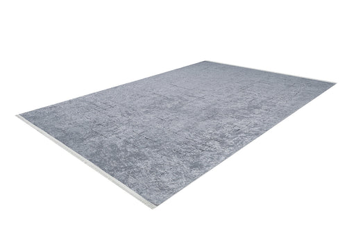 Bild 1 in Galerieansicht laden. The Bohemian Driftwood - Washable Rug (JR1951) is a rectangular, light gray rug with a subtle textured pattern, shown angled on a white background—ideal for high-traffic spaces.