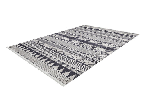 Load image 1 in gallery view. The Bohemian Sunrise - Washable Rug - JR1713 features a black and white geometric pattern with triangles, diamonds, and lines. Stylish and convenient for high-traffic areas, this rectangular rug is shown on a white background.