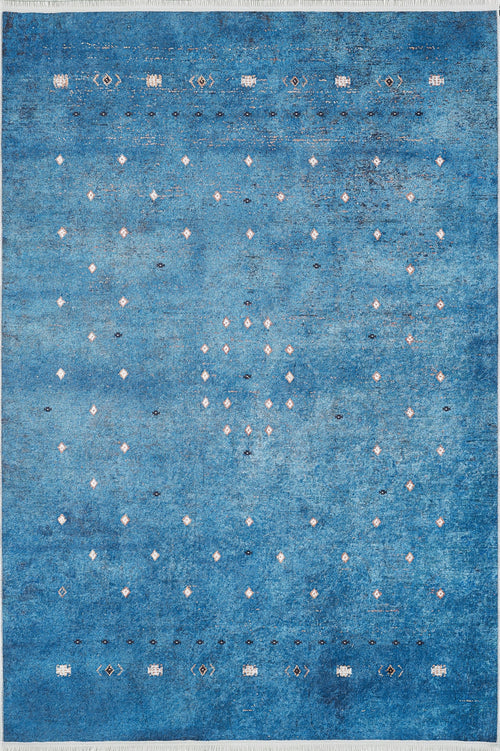 Load image 1 in gallery view. The Bohemian Whirlwind - Washable Rug (JR1989) features blue gradient tones with white and black diamond motifs in rows and a central circle, making it a stylish, practical choice for high-traffic areas.