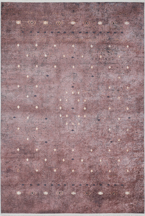 Bild 1 in Galerieansicht laden. The Boho Magic - Washable Rug - JR1993 features a rectangular, washable design with a faded mauve background and small geometric motifs in white, yellow, and dark blue—ideal for allergy-sensitive homes wanting style beyond typical bronze and brown rugs.