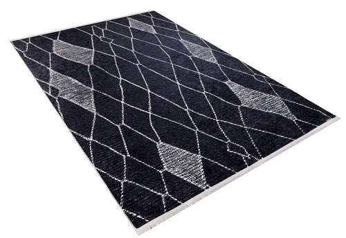 Load image 1 in gallery view. The Byzantine Beauty - Washable Rug (JR1037) is a rectangular black rug with an abstract white crisscross and diamond design, ideal for high-traffic areas. Shown angled against a white background.