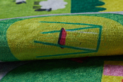 Bild 1 in Galerieansicht laden. A close-up of the City Adventure - Machine-Washable Rug JRC039, a colorful, textured flat weave featuring a simple red and green chair on yellow, with abstract and nature-inspired designs in the background.
