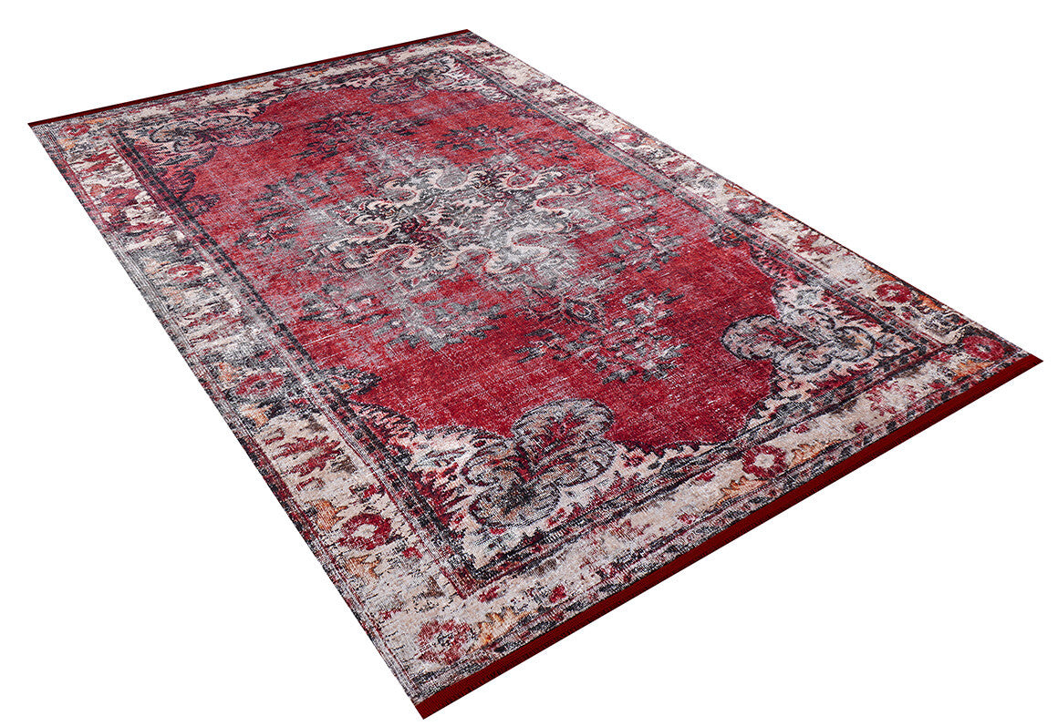 The Classic Revival - Washable Rug - JR1374 is a rectangular red vintage-style rug with ornate white and gray patterns and a decorative border, ideal for high-traffic areas, shown on a white background.