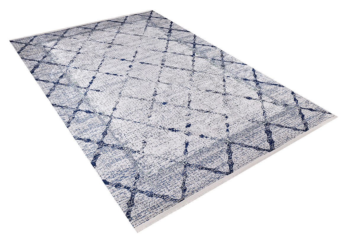 The Classic Trellis - Washable Rug - JR710 is a rectangular flat weave rug with a white background and blue geometric crisscross pattern, featuring a contemporary distressed, textured look.