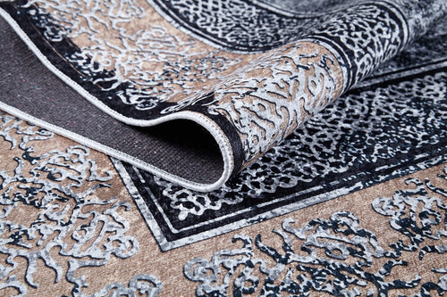 Bild 1 in Galerieansicht laden. A close-up of the Contemporary Borderline - Washable Rug - JR1798 reveals its ornate beige and black flat weave, a folded corner highlighting intricate textures—an allergy-friendly, stylish addition perfect for any space.