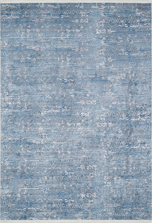 Load image 1 in gallery view. The Contemporary Serenity - Machine-Washable Rug JR1884 is a rectangular blue rug with a textured, abstract pattern in blue and light gray. Soft, tranquil, and featuring finished edges with a subtle border—ideal for high-traffic areas.