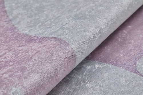 Load image 1 in gallery view. Close-up of the Cosmic Naptime - Machine-Washable Rug JRC032, showcasing its soft, velvety lavender and light gray tones with a subtle abstract pattern—bringing gentle elegance reminiscent of soft pink rugs.