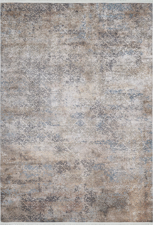 Bild 1 in Galerieansicht laden. The Elegant Leaf - Washable Rug - JR1945 is a rectangular rug featuring a distressed, vintage-style pattern in beige, grey, and blue tones with subtle abstract and faded ornamental details—ideal for high-traffic areas.