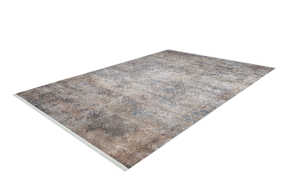 The Elegant Leaf - Washable Rug - JR1945 features a rectangular, vintage-style distressed pattern in brown, beige, and blue. Ideal for high-traffic areas, it's shown from an angled view against a white background.