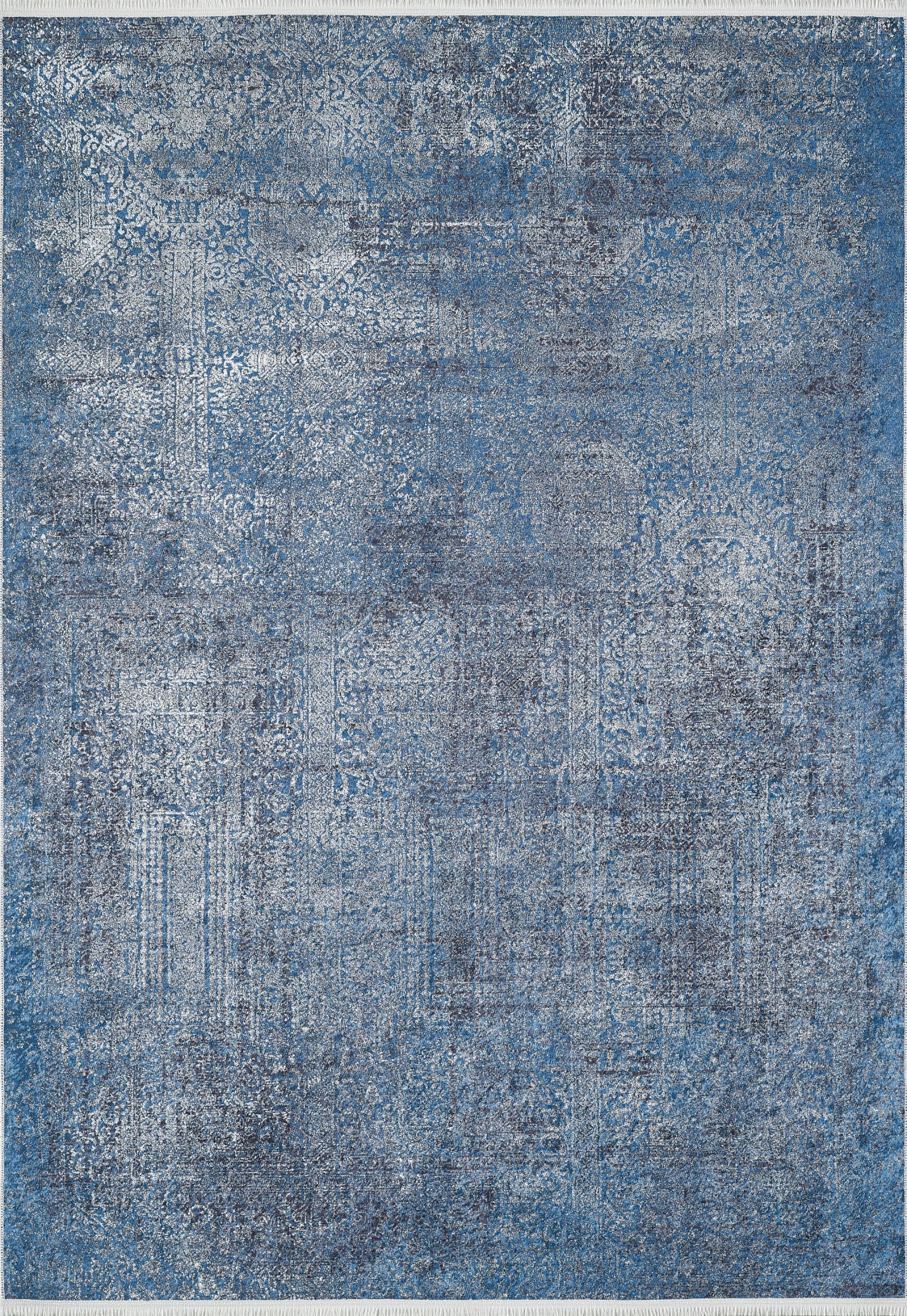 The Elegant Vine - Washable Rug - JR1847 is a large rectangular rug with a distressed vintage-style blue and gray pattern, featuring intricate, faded floral and geometric motifs throughout.