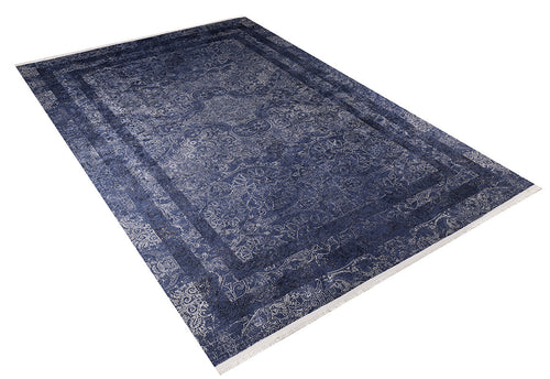 Load image 1 in gallery view. The Elegant and Modern - Washable Rug - JR1297 is a large rectangular blue rug with ornate blue and white patterns, a detailed border, and central motifs. Perfect for high-traffic areas, it's shown on a white background.