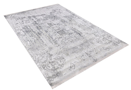Load image 1 in gallery view. The Faint Memories - Washable Rug - JR1437 is a large rectangular anthracite-gray rug featuring a distressed vintage pattern in gray and white. Stylish and durable, it's the perfect practical accent for any space.