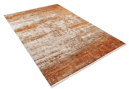 Load image 1 in gallery view. The Fluffy Brushed - Washable Rug - JR584 is a rectangular orange flat weave rug with abstract patterns in brown, orange, and beige. It features a textured look with visible fibers and is shown on a white background.