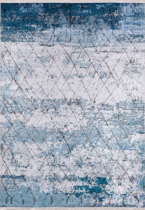 Load image 1 in gallery view. The Geometric Glimmers - Washable Rug - JR1423 is a rectangular blue rug with an abstract, distressed design and subtle brown diamond lines. Its modern texture suits high-traffic or artistic spaces, and it’s easy to clean.