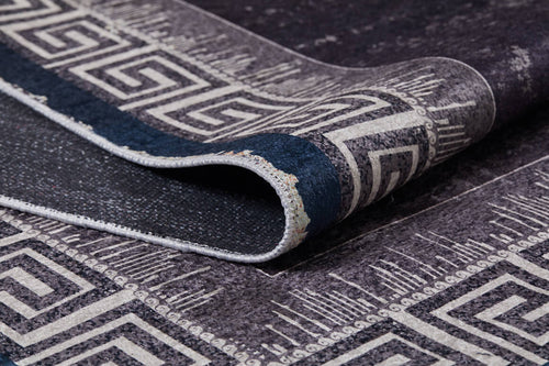 Load image 1 in gallery view. Close-up of the Geometric and Chic - Washable Rug - JR1273, highlighting its white Greek key pattern on a dark background, decorative border, and textured surface—durable, stylish, and perfect for high-traffic areas.