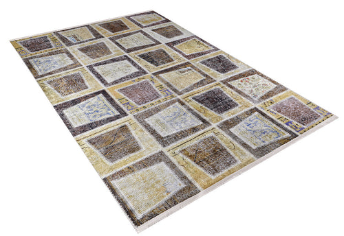 Load image 1 in gallery view. The Gridiron Glow - Washable Rug - JR183 features a rectangular patchwork design in brown, beige, yellow, and cream tones. Perfect for high-traffic areas, this stylish rug adds a bronze and brown look to any space.