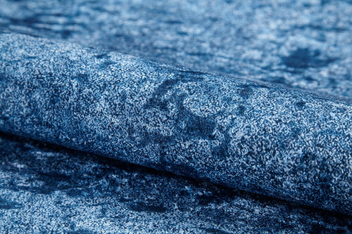 Load image 1 in gallery view. A close-up of the Ivory Whisper - Washable Rug (JR1628) featuring a soft, plush surface and mottled pattern—ideal for adding comfort to high-traffic areas.