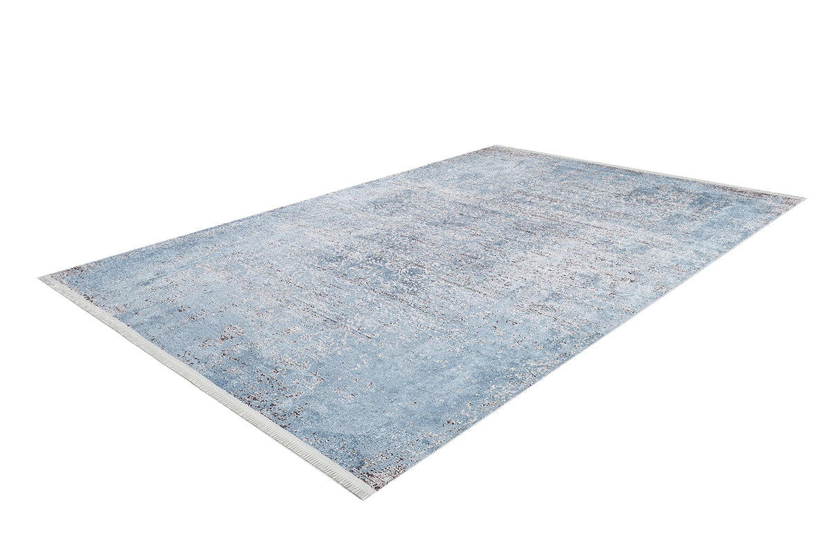 The Old World Charm - Washable Rug - JR1606 is a rectangular light blue rug with a slightly distressed texture and white fringed edges, perfect for high-traffic areas, shown on a white background.