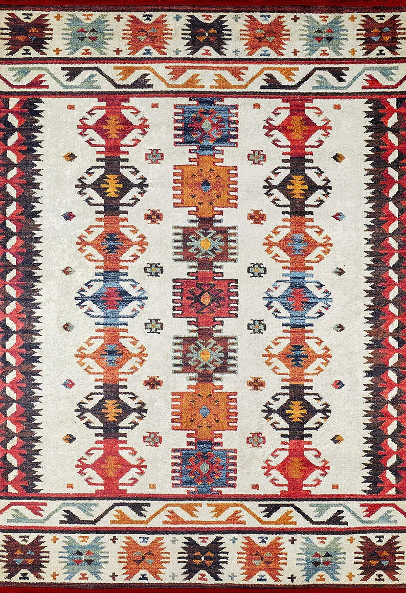 The Rustic Refrain - Washable Rug - JR149 is a flat weave, multicolor rug with geometric shapes in red, orange, blue, yellow, and black on a cream background, featuring symmetrical designs and bold end borders.