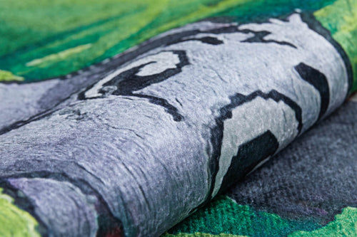 Load image 1 in gallery view. A close-up of the Safari Buddies - Machine-Washable Rug JRC041, rolled up to display its multicolor abstract green, gray, black, and white patterns. The rug’s vibrant design and durable texture make it ideal for high-traffic areas.