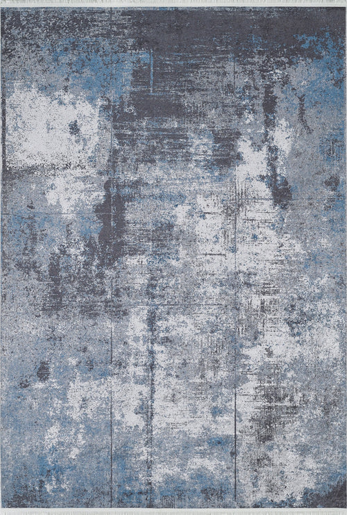 Load image 1 in gallery view. The Solar Eclipse - Washable Rug - JR1921 features a distressed abstract pattern in blue, gray, and white with a weathered, artistic look—perfect for high-traffic areas and easy to clean.