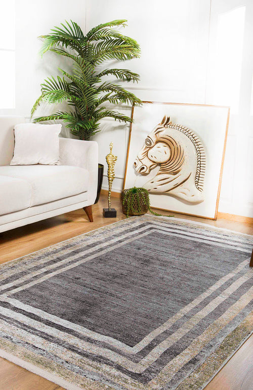 Load image 1 in gallery view. A modern living room with a light sofa, leafy plant, horse artwork on the floor, a decorative trophy, and the Sophisticated Trellis - Washable Rug - JR1194—great for high-traffic and allergy-friendly homes.