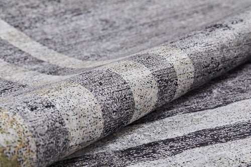 Load image 1 in gallery view. Close-up of the Sophisticated Trellis - Washable Rug - JR1194, featuring a textured, speckled surface in gray, black, and white with horizontal stripes and abstract lines—perfect for allergy-sensitive or high-traffic areas.
