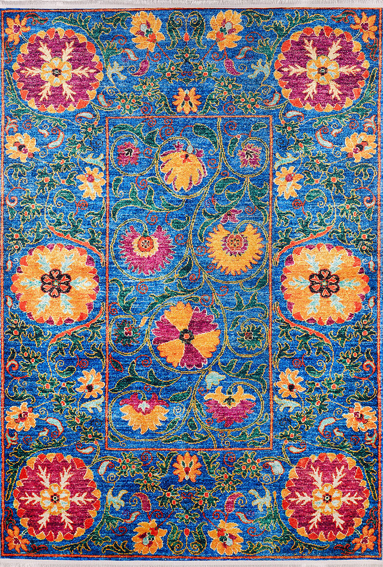 The Summer Bouquet - Washable Rug - JR1358 is a vibrant rectangular blue rug with a rich background, featuring swirling vine patterns and colorful floral motifs, bordered by matching smaller florals—ideal for high-traffic areas.