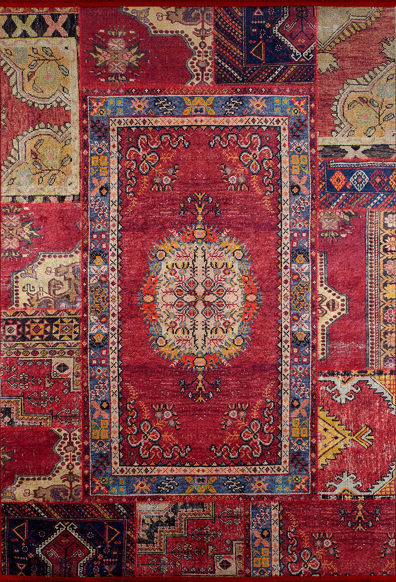 The Tapestry Tango - Washable Rug - JR313 features a vibrant patchwork with cream, blue, green, and yellow floral and geometric motifs on a bold red center—durable and perfect for high-traffic spaces.