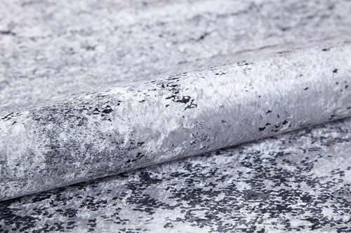 Load image 1 in gallery view. A close-up of textured wallpaper with a metallic silver-gray marbled design and black speckles, a reflective finish, and ideal for pairing with the Techno Flux - Washable Rug - JR1814 to enhance any modern space.