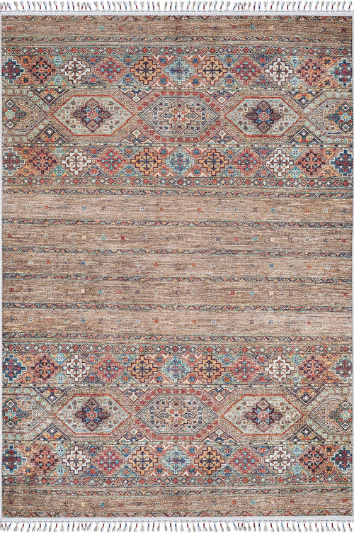 Load image 1 in gallery view. The Tribal Tango - Washable Rug - JR5089 is a rectangular rug with geometric and floral patterns in bronze, brown, blue, and red tones. Its fringed edges and machine-washable design make it ideal for high-traffic areas.