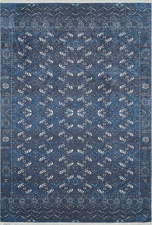 Load image 1 in gallery view. The Tribal Trail - Washable Rug - JR1939 is a rectangular blue rug with white and light blue geometric and floral patterns, decorative border, and durable construction—perfect for high-traffic areas and easy to maintain.